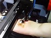 Badass Russian Puts His Arm In A Laser Engraving Machine