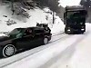 BMW Pulls A Huge Truck Up A Snowy Hill

