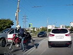 Car Hits A Cyclist At A Crossing Hen Grabs The Wrong Dude
