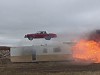 Car Successfully Jumps A Flaming Building