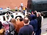 Crowd Goes Wild When Police Crash Into Themselves
