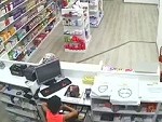 Dad Distracts The Pharmacist Whilst His Son Robs The Register
