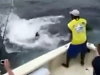 Deckhand Goes Overboard Trying To Pull In A Big Fish
