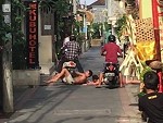 Drunk Aussie Bogans Receive Some Scooter Justice In Kuta
