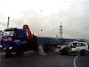 Dumbass Almost Misses His Turn And Side Swipes A Large Truck