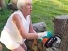Grey Haired Granny Chainsaws Down A Tree
