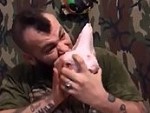Hard Russian Guy Eats A Raw Sheep's Head

