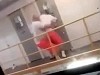 Inmate Thrown Over Railing During Prison Fight
