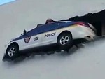 Is This Police Car Really Crashed Or Is It Just Art
