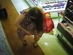 Just A Girl Caught On CCTV Testing Out Perfumes
