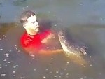 Maniac Swimming With His Crocodile Friend
