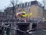 Medivac Helicopter Lands On A Bridge In Amsterdam

