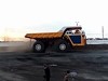 Miners Use A Haulpak To Flatten A Car For Fun