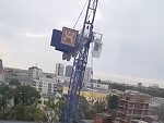 Office Workers Watch As Crane Topples Over
