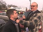 Old Timer Punches A Reporter In The Face
