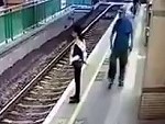 Psycho Pushes An Woman On To The Rail Tracks In Hong Kong
