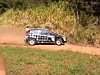 Rally Car Launches A Stone At A Guys Face