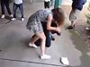 Schoolgirl Kicks A Dudes Butt Then Bails Before She Gets Busted