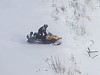 Snow Mobiler Takes One Too Many Chances
