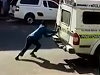 Suspects Wiggle Out Of A Police Van While The Cops Stop For Lunch