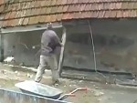 Takes His Life Into His Hands Demolishing A Roof
