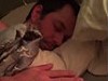 Tired Dad Comforting His Newborn