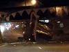 Truck Trailer Utterly Disintegrated Passing Under A Low Bridge
