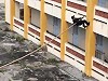 Vietnamese Cops Easily Climb A Building