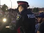 Woman Cop Grabs A Mic And Starts Dropping Bombs
