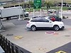 Woman Mounts Her Car To Prevent It Being Stolen

