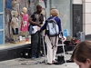 Woman Tries To Silence Street Performer But The Audience React In An Amazing Way