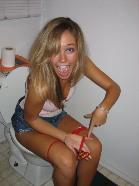 Girls Caught Sitting On The Loo 03