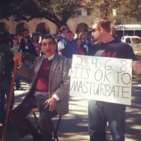 Protester Signs 18