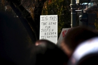 Protester Signs 23