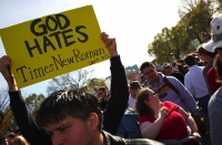 Protester Signs 24