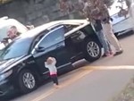 2-Year-Old Girl Puts Her Hands Up
