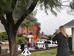 Aftermath Of A Light Plane Crashing Into A House
