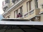 Couple Fuck On Their Balcony Above A Cafe Strip
