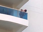 Couple Fucking Go At It High Upon A Balcony
