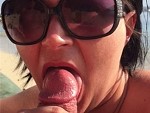 She Sucks His Dick On The Beach Then Swallows
