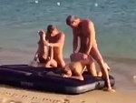 Two Couples Fucking Together On The Shore
