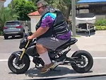 Big Dude Looks Ridiculous On That Bike
