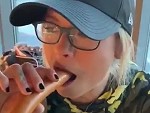 Blonde Shows What She Can Do With A Sausage
