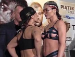 Boxer Psyches Out Her Opponent With A Peck
