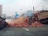 Brick Transport Truck Loses Its Load Onto A Car