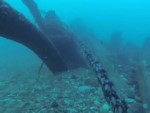 Bricks Are Shat As A Cargo Ship Passes Over A Diver
