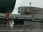 Cargo Ship Rear Ends Another Coming Into The Docks
