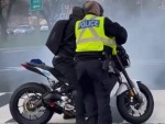 Cop Helps A Rider Rip A Sick Burnout
