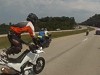 Cop Manages To Stop A Couple Of Riders With A Brake Check