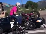 Cop Pulls His Gun On A Biker Up On One Wheel
